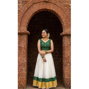 Classic Kasavu Pattu Pavada Set With Emerald Green Brocade Blouse
