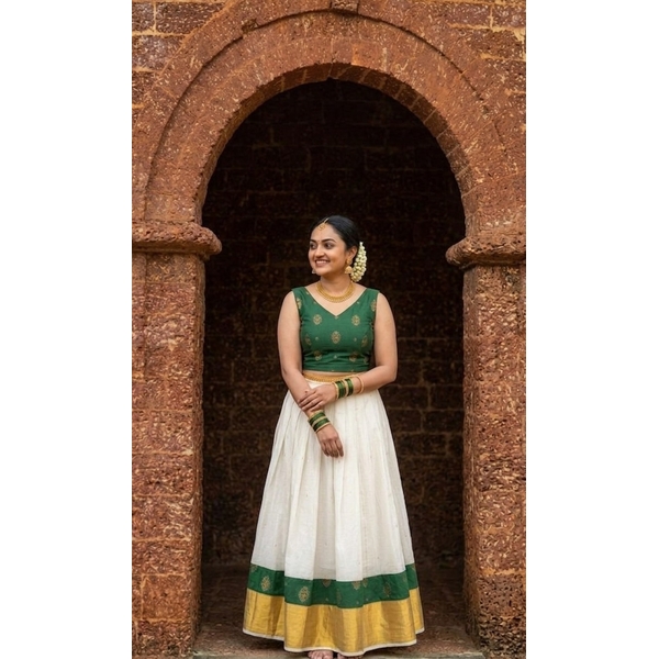 Classic Kasavu Pattu Pavada Set With Emerald Green Brocade Blouse